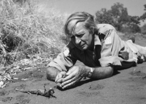 Laurens Van der Post with a praying mantis.